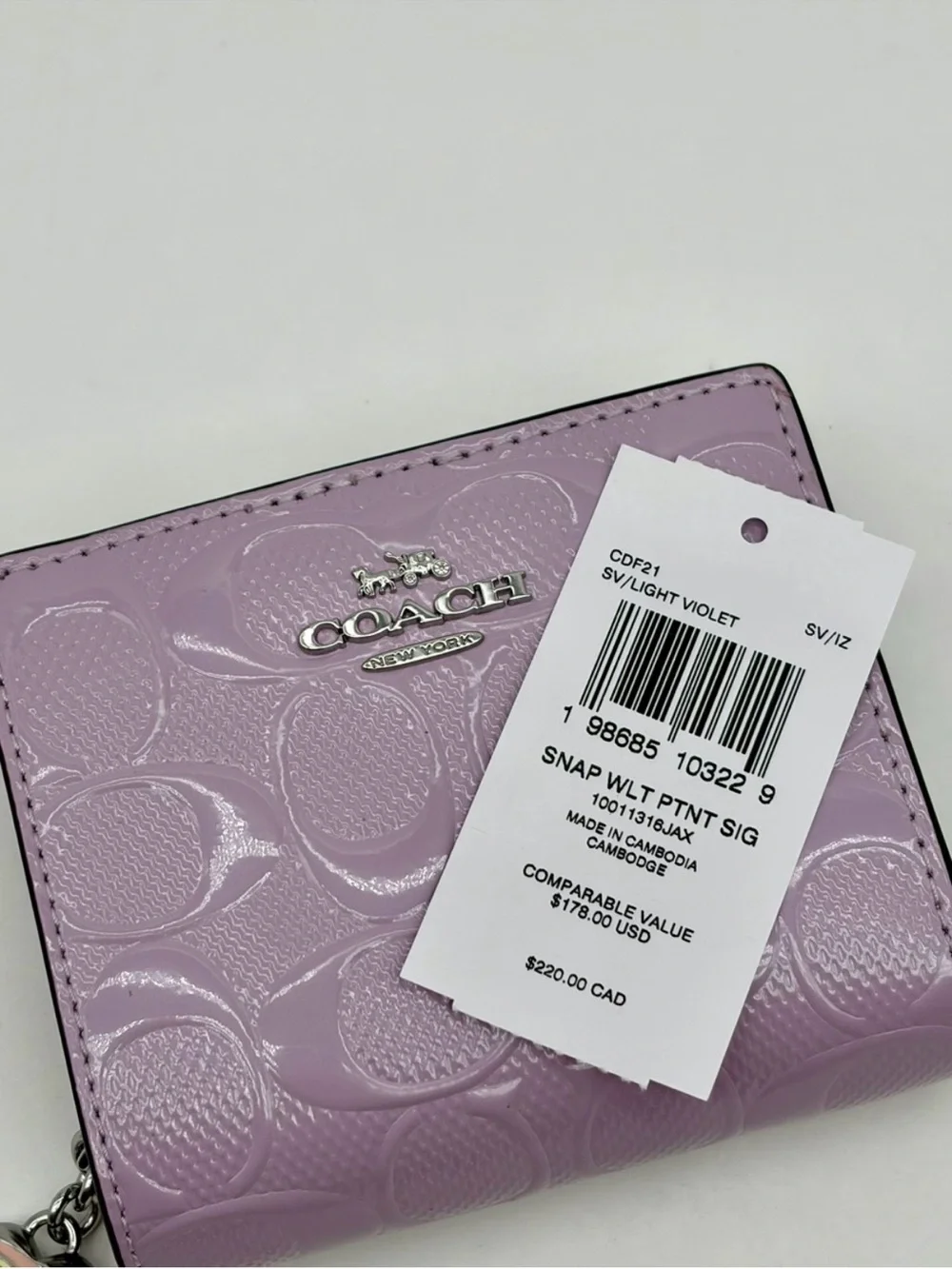 Coach Embossed Wallet in Lilac with Heart Charm